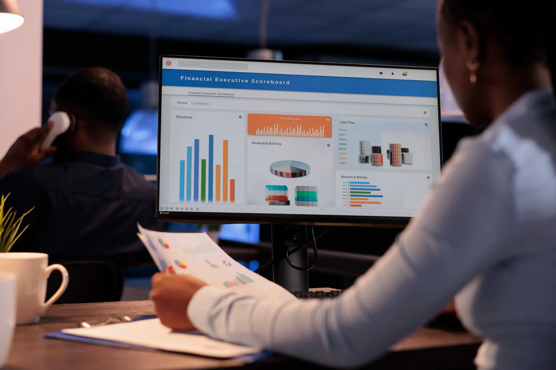 Business professional analyzing Microsoft Dynamics 365 financial dashboards, showing how data quality issues persist even in well-implemented systems with Dynamics Monk.